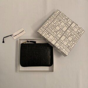 Comme des Garcons WALLET embossed leather pouch